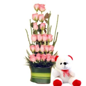 Glass Vase Arrangement Of Pink Roses With a Teddy